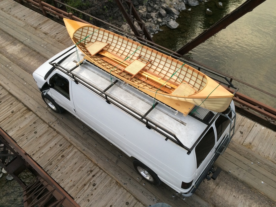skin on frame adirondack guideboat on van