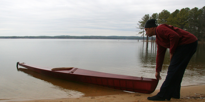 Tyak custom built skin-on-frame racing kayak