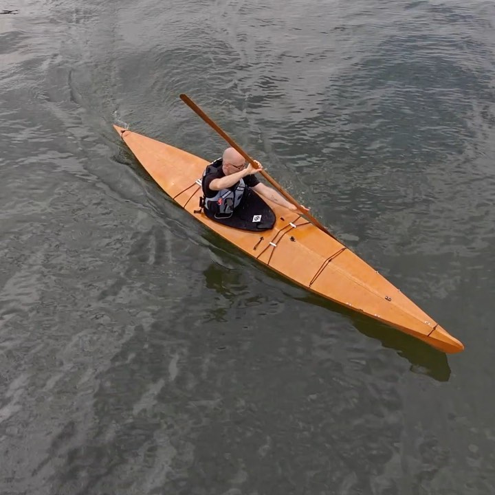 Kayaker in a skin on frame kayak