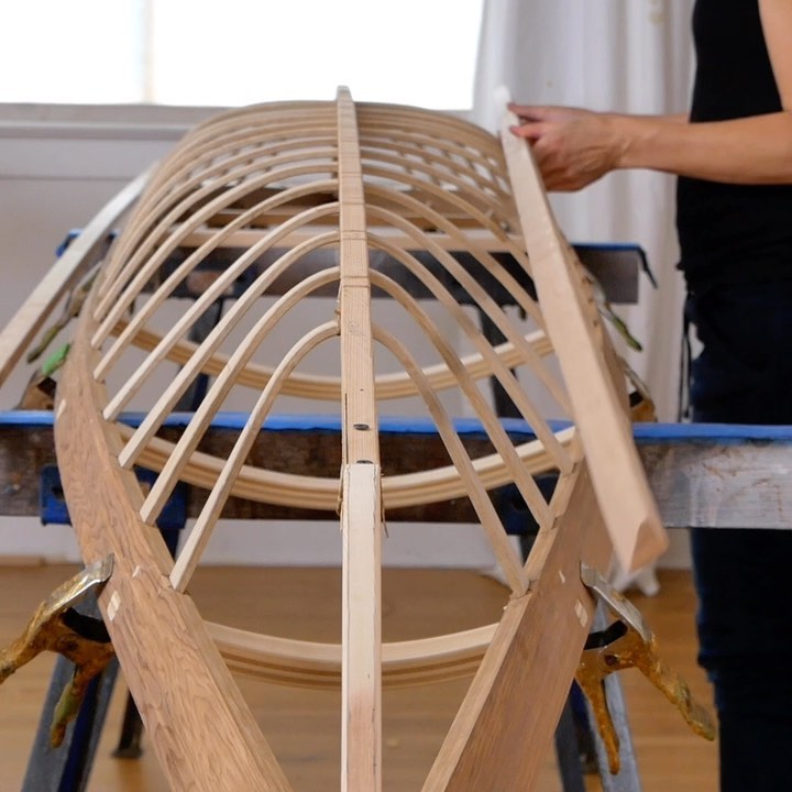 placing the stringers onto a skin on frame kayak