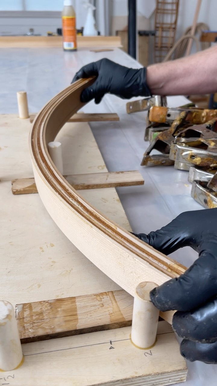 bending strips of cedar onto a jig