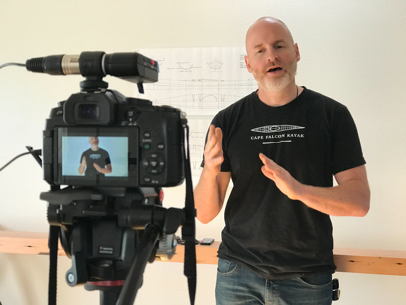 Brian Schulz of Cape Falcon Kayak teaching in front of a camera